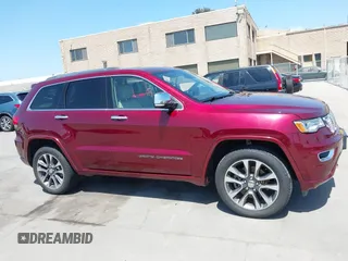 2017 Jeep Grand Cherokee Overland with VIN 1C4RJFCTXHC676236, listed as a IAAI auction lot 42164645 with 94,658 mi miles and . Bid and sale history available at DreamBid. Image 13.