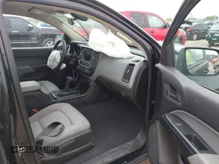 2021 Chevrolet Colorado 2WD Work Truck z VIN 1GCGSBEN5M1293788, wystawiony jako IAAI lot #42072335 z przebiegiem 66 806 mil mil oraz . Historia ofert i sprzedaży dostępna na DreamBid. Obrazek 5.