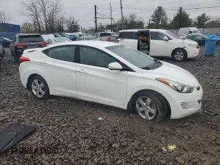 2013 Hyundai Elantra GLS z VIN 5NPDH4AE1DH424095, wystawiony jako Copart lot #52617945 z przebiegiem Nie podano mil oraz Szkody całkowita. Historia ofert i sprzedaży dostępna na DreamBid. Obrazek 4.