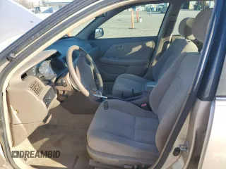 2000 Toyota Camry CE z VIN 4T1BG22K7YU738912, wystawiony jako Copart lot #88852845 z przebiegiem 122 569 mil mil oraz Szkoda całkowita • Salvage title. Historia ofert i sprzedaży dostępna na DreamBid. Obrazek 7.