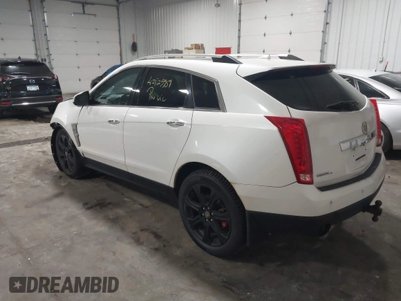 2012 Cadillac SRX Premium Collection with VIN 3GYFNFE39CS561614, listed as a IAAI auction lot 42529959 with 59,088 mi miles and . Bid and sale history available at DreamBid. Image 3.