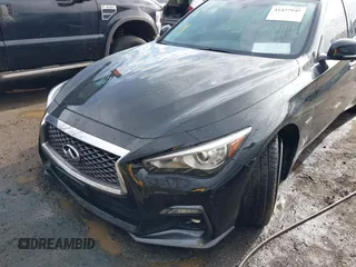 2020 Infiniti Q50 Red Sport 400 with VIN JN1FV7AR3LM660552, listed as a IAAI auction lot 41477949 with 53,392 mi miles and . Bid and sale history available at carsss.com. Image 6.