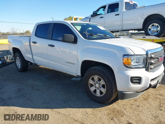 2015 GMC Canyon 2WD with VIN 1GTG5AE39F1140916, listed as a IAAI auction lot 41298357 with 96,050 mi miles and . Bid and sale history available at DreamBid. Image 1.