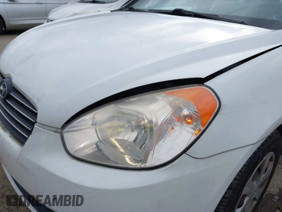 2007 Hyundai Accent GLS with VIN KMHCN46C67U097159, listed as a IAAI auction lot 41913373 with 103,303 mi miles. Bid and sale history available at carsss.com. Image 13.