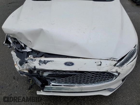2019 Ford Fusion Titanium с VIN 3FA6P0RU6KR212454, выставлен на аукционе Copart как лот 63137755 с пробегом 30 024 миль миль и Списание • Salvage title. История ставок и продаж доступна на DreamBid. Изображение 11.