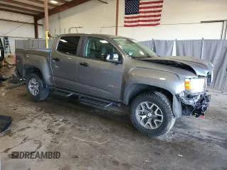 2022 GMC Canyon 4WD AT4 z VIN 1GTG6FEN0N1162393, wystawiony jako Copart lot #55286065 z przebiegiem 55 185 mil mil oraz Szkoda całkowita • Salvage title. Historia ofert i sprzedaży dostępna na DreamBid. Obrazek 4.