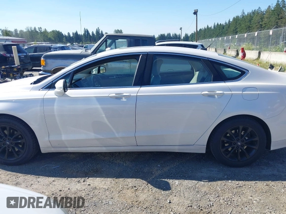 2017 Ford Fusion SE z VIN 3FA6P0HD3HR132779, wystawiony jako IAAI lot #42690212 z przebiegiem 165 293 mil mil oraz . Historia ofert i sprzedaży dostępna na DreamBid. Obrazek 14.