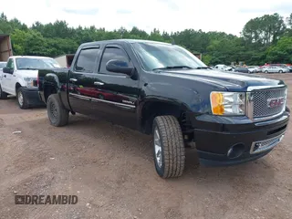 2013 GMC Sierra 1500 Denali z VIN 3GTP2XE25DG354495, wystawiony jako IAAI lot #42366210 z przebiegiem 146 876 mil mil oraz . Historia ofert i sprzedaży dostępna na DreamBid. Obrazek 1.