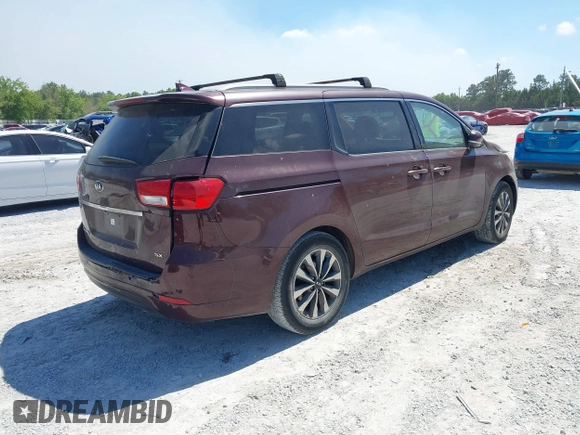 2015 Kia Sedona EX with VIN KNDMC5C19F6018139, listed as a IAAI auction lot 42031165 with 136,484 mi miles. Bid and sale history available at carsss.com. Image 4.