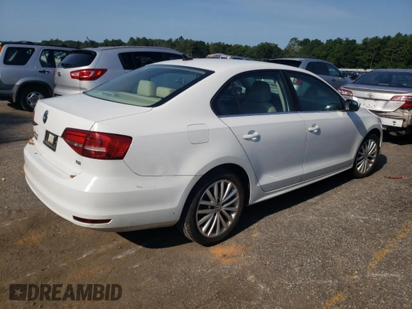 2015 Volkswagen Jetta SE z VIN 3VWD07AJ8FM224623, wystawiony jako Copart lot #62408765 z przebiegiem 142 827 mil mil oraz Czysty tytuł • Clean title. Historia ofert i sprzedaży dostępna na DreamBid. Obrazek 3.