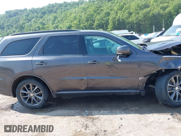 2018 Dodge Durango GT z VIN 1C4RDJDG9JC497428, wystawiony jako IAAI lot #42478979 z przebiegiem 71 247 mil mil oraz . Historia ofert i sprzedaży dostępna na DreamBid. Obrazek 14.