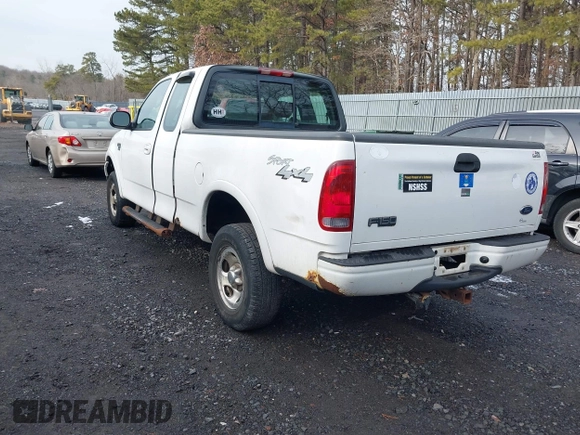 2003 Ford F-150 XL with VIN 1FTRX18W43NB84285, listed as a IAAI auction lot 41494919 with 197,352 mi miles. Bid and sale history available at carsss.com. Image 3.