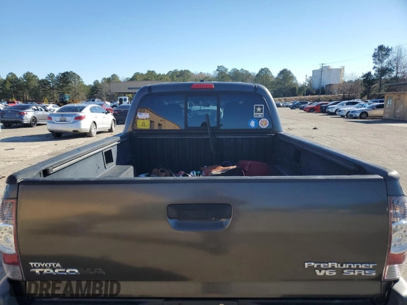 2010 Toyota Tacoma PreRunner with VIN 3TMKU4HN3AM025218, listed as a Copart auction lot 87600035 with 92,605 mi miles and Salvage title. Bid and sale history available at DreamBid. Image 6.