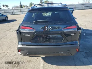 2024 Toyota Corolla Cross XLE with VIN 7MUDAAAGXRV073103, listed as a Copart auction lot 86753294 with 5,667 mi miles and Salvage title. Bid and sale history available at DreamBid. Image 6.
