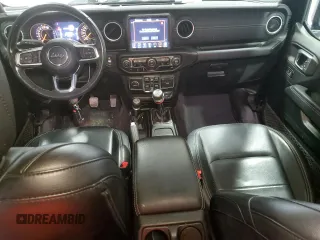 2021 Jeep Wrangler Unlimited Sahara High Altitude with VIN 1C4HJXEG9MW571844, listed as a Copart auction lot 81482334 with 77,409 mi miles and Salvage title. Bid and sale history available at DreamBid. Image 8.