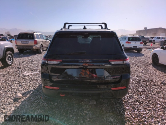 2022 Jeep Grand Cherokee Trailhawk with VIN 1C4RJHCG1N8574207, listed as a Copart auction lot 52789925 with 31,549 mi miles and Salvage title. Bid and sale history available at DreamBid. Image 6.