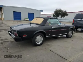 1975 FIAT 124 Spider z VIN 124CS10095845, wystawiony jako Copart lot #86344634 z przebiegiem 86 863 mil mil oraz Czysty tytuł • Clean title. Historia ofert i sprzedaży dostępna na DreamBid. Obrazek 3.