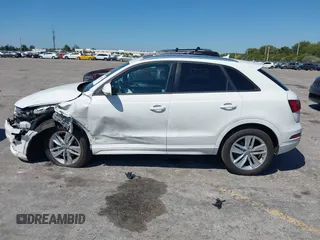 2017 Audi Q3 Premium with VIN WA1BCCFSXHR016914, listed as a IAAI auction lot 41784539 with 94,862 mi miles and . Bid and sale history available at DreamBid. Image 14.
