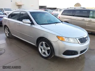 2009 Kia Optima LX with VIN KNAGE228195306331, listed as a IAAI auction lot 41756692 with 237,558 mi miles. Bid and sale history available at carsss.com. Image 1.