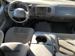 2003 Ford F-150 XLT with VIN 1FTRW08673KA38056, listed as a Copart auction lot 42772435 with 129,104 mi miles and Salvage Title. Bid and sale history available at carsss.com. Image 8.