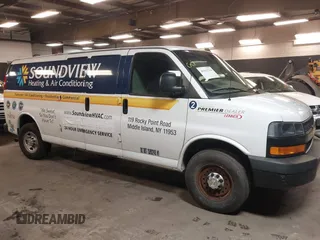 2020 Chevrolet Express Cargo Van with VIN 1GCWGBFB4L1205443, listed as a IAAI auction lot 41612714 with 87,883 mi miles. Bid and sale history available at carsss.com. Image 13.