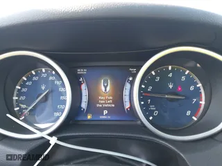 2014 Maserati Ghibli S Q4 with VIN ZAM57RTA2E1086046, listed as a IAAI auction lot 41846389 with 55,984 mi miles. Bid and sale history available at carsss.com. Image 7.