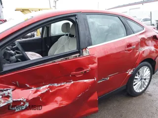 2018 Ford Focus Titanium with VIN 1FADP3J20JL280698, listed as a IAAI auction lot 41823530 with 54,841 mi miles and . Bid and sale history available at DreamBid. Image 14.