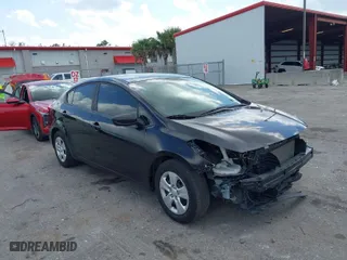 2018 Kia Forte LX with VIN 3KPFK4A78JE227114, listed as a IAAI auction lot 41977992 with 63,327 mi miles. Bid and sale history available at carsss.com. Image 1.
