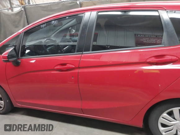 2016 Honda Fit LX with VIN JHMGK5H50GX003602, listed as a IAAI auction lot 42317398 with 58,612 mi miles and . Bid and sale history available at DreamBid. Image 14.