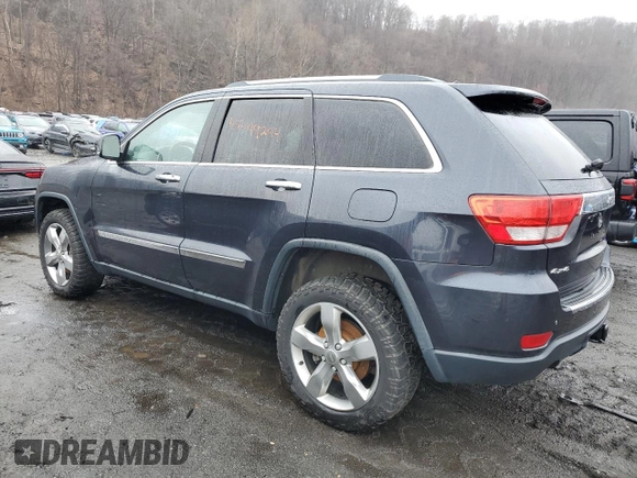 2013 Jeep Grand Cherokee Overland with VIN 1C4RJFCT6DC586933, listed as a Copart auction lot 45499294 with 80,249 mi miles and Salvage Title. Bid and sale history available at carsss.com. Image 2.