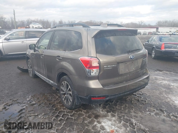2017 Subaru Forester Touring with VIN JF2SJGWC1HH581460, listed as a IAAI auction lot 41326532 with 59,454 mi miles. Bid and sale history available at carsss.com. Image 3.