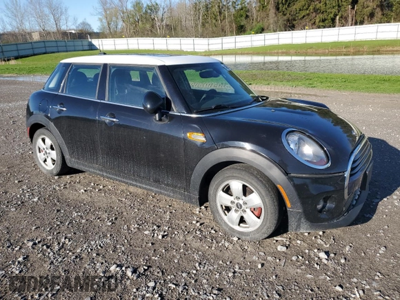 2016 MINI Hardtop 4 Door with VIN WMWXU1C50G2D09465, listed as a Copart auction lot 54975005 with 62,715 mi miles and Salvage Title. Bid and sale history available at DreamBid. Image 4.