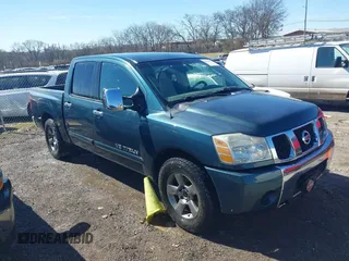 2005 Nissan Titan XE with VIN 1N6AA07A65N512479, listed as a IAAI auction lot 41659482 with 225,037 mi miles and . Bid and sale history available at DreamBid. Image 1.