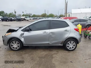 2013 Mazda Mazda2 Sport with VIN JM1DE1KY6D0170767, listed as a IAAI auction lot 41761689 with 142,743 mi miles. Bid and sale history available at carsss.com. Image 14.