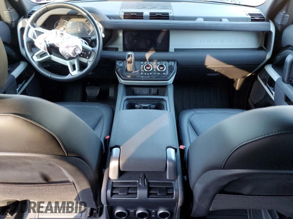 2023 Land Rover Defender S with VIN SALEJ7EX3P2121582, listed as a Copart auction lot 77433164 with 26,507 mi miles and Salvage title. Bid and sale history available at DreamBid. Image 8.