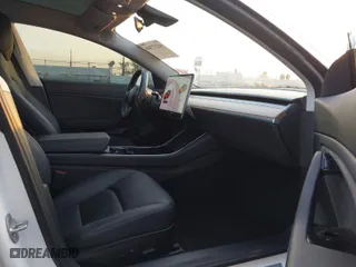 2018 Tesla Model 3 Long Range Battery with VIN 5YJ3E1EA1JF164821, listed as a IAAI auction lot 41277446 with 31,602 mi miles. Bid and sale history available at carsss.com. Image 5.