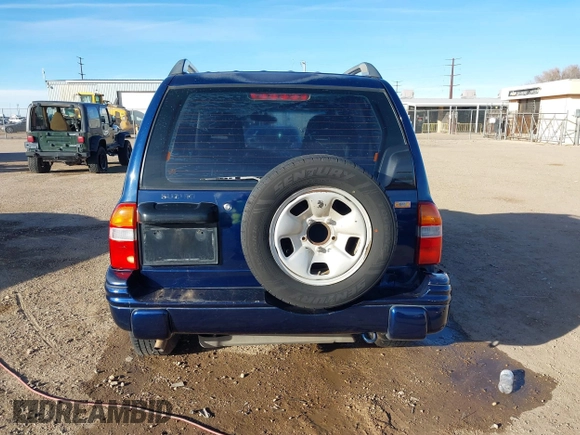 2003 Suzuki Vitara z VIN 2S3TE52V436101091, wystawiony jako IAAI lot #41472279 z przebiegiem 163 429 mil mil oraz . Historia ofert i sprzedaży dostępna na DreamBid. Obrazek 16.