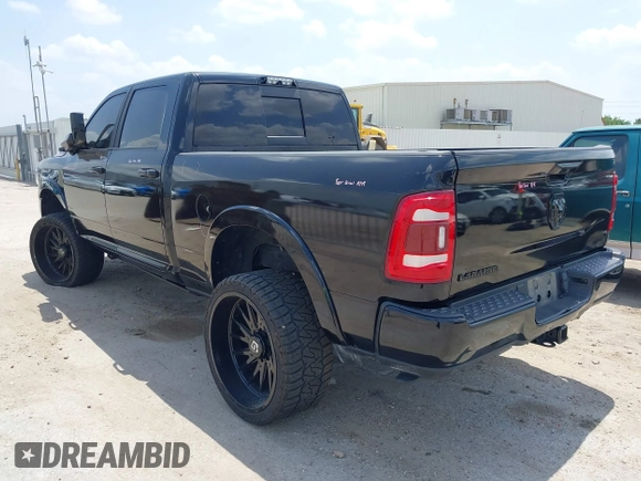 2021 Ram 2500 Laramie with VIN 3C6UR5FL7MG621346, listed as a IAAI auction lot 42419962 with 96,647 mi miles and . Bid and sale history available at DreamBid. Image 3.