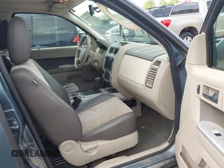 2011 Mercury Mariner Premier with VIN 4M2CN9HG7BKJ02899, listed as a IAAI auction lot 42490843 with 268,830 mi miles and . Bid and sale history available at DreamBid. Image 5.