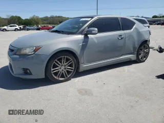 2012 Scion tC z VIN JTKJF5C72C3041623, wystawiony jako Copart lot #52316555 z przebiegiem 175 809 mil mil oraz Czysty tytuł • Clean title. Historia ofert i sprzedaży dostępna na DreamBid. Obrazek 1.