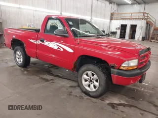 2003 Dodge Dakota z VIN 1D7GG36XX3S296482, wystawiony jako IAAI lot #42127807 z przebiegiem 199 096 mil mil oraz . Historia ofert i sprzedaży dostępna na DreamBid. Obrazek 1.