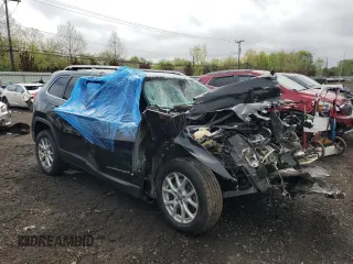 2015 Jeep Cherokee Latitude z VIN 1C4PJMCS2FW753051, wystawiony jako Copart lot #55651655 z przebiegiem 116 766 mil mil oraz Szkoda całkowita • Salvage title. Historia ofert i sprzedaży dostępna na DreamBid. Obrazek 4.