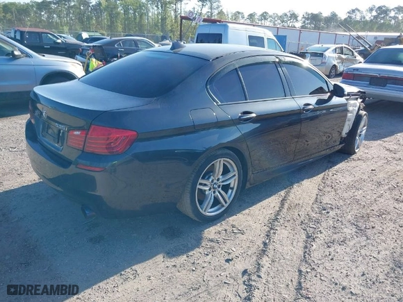 2014 BMW 5 Series 535i with VIN WBA5B1C54ED475113, listed as a IAAI auction lot 42077901 with 145,341 mi miles. Bid and sale history available at carsss.com. Image 4.