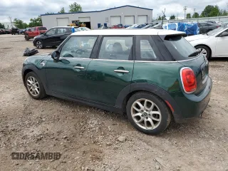 2019 MINI Hardtop 4 Door Cooper with VIN WMWXU1C51K2F82567, listed as a Copart auction lot 63321725 with 96,770 mi miles and Salvage title. Bid and sale history available at DreamBid. Image 2.