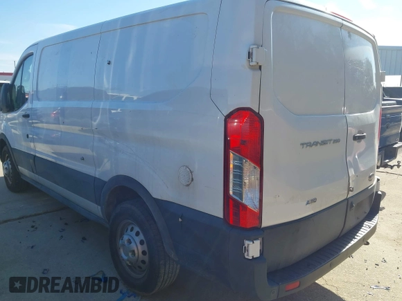 2020 Ford Transit Cargo z VIN 1FTBR2Y80LKA19838, wystawiony jako IAAI lot #41648913 z przebiegiem 60 789 mil mil oraz . Historia ofert i sprzedaży dostępna na DreamBid. Obrazek 3.