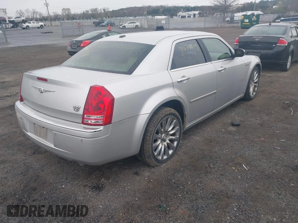 2009 Chrysler 300 with VIN 2C3LA63T89H622085, listed as a IAAI auction lot 41872519 with 151,543 mi miles. Bid and sale history available at carsss.com. Image 4.