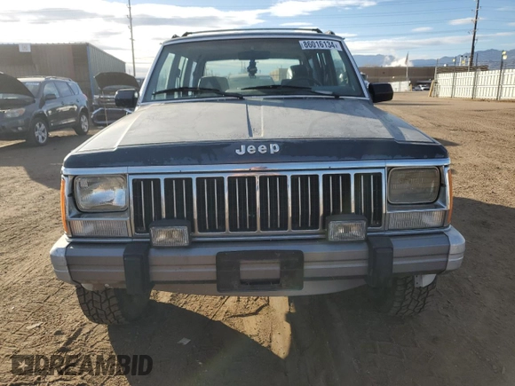 1992 Jeep Cherokee with VIN 1J4FJ58S7NL136135, listed as a Copart auction lot 86016134 with 160,259 mi miles and Clean title. Bid and sale history available at DreamBid. Image 5.