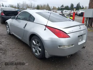 2004 Nissan 350Z Touring with VIN JN1AZ34E64T061197, listed as a IAAI auction lot 41917013 with 70,121 mi miles. Bid and sale history available at carsss.com. Image 3.