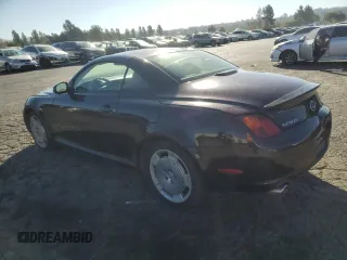 2002 Lexus SC 430 with VIN JTHFN48Y120027674, listed as a Copart auction lot 71220864 with 135,125 mi miles and Salvage Title. Bid and sale history available at carsss.com. Image 2.