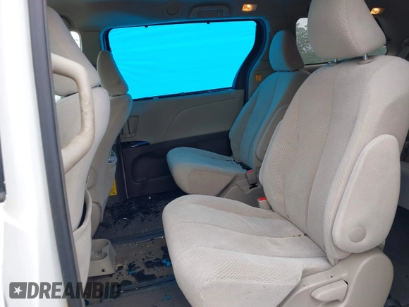 2013 Toyota Sienna LE with VIN 5TDJK3DC9DS055134, listed as a IAAI auction lot 42255532 with 156,381 mi miles and . Bid and sale history available at DreamBid. Image 8.